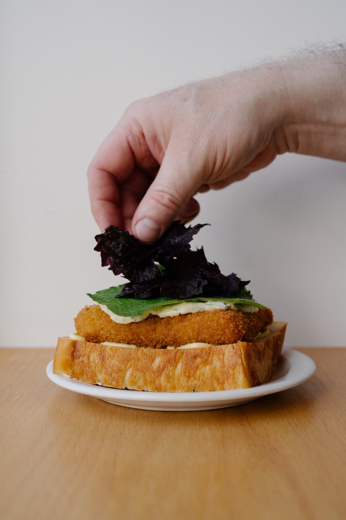 Shiso leaves placed on a cutlet